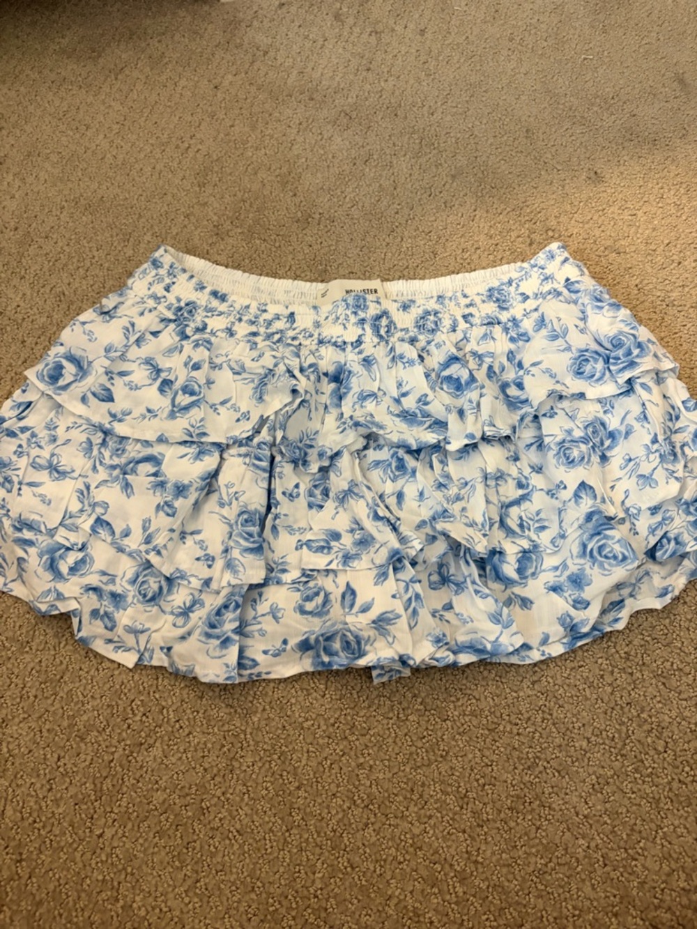 Hollister White Mini Skirt with Blue Rose Print Ruffles